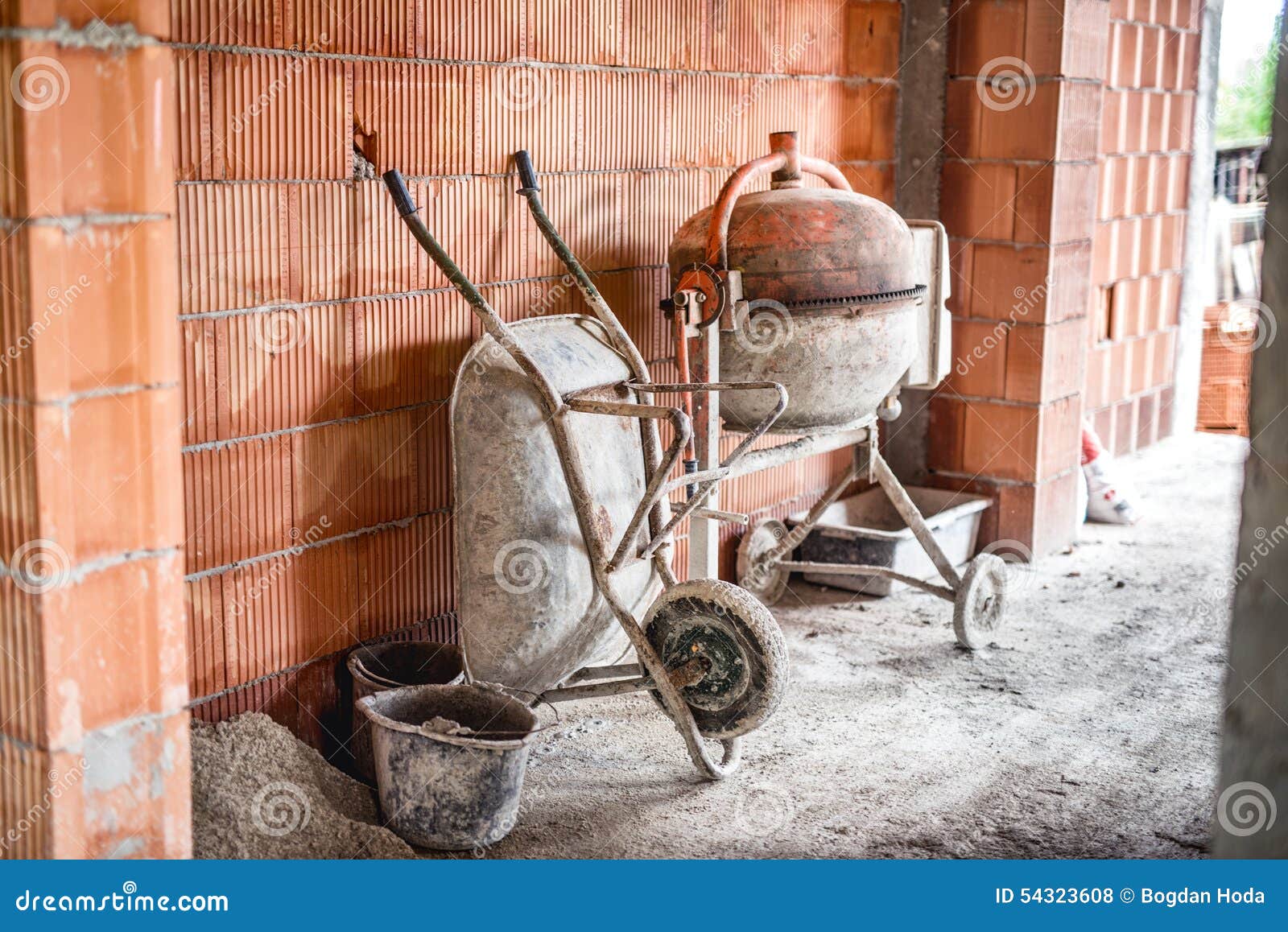 Cement Mixer Machine, Wheel Barrow and Other Construction Site Tools