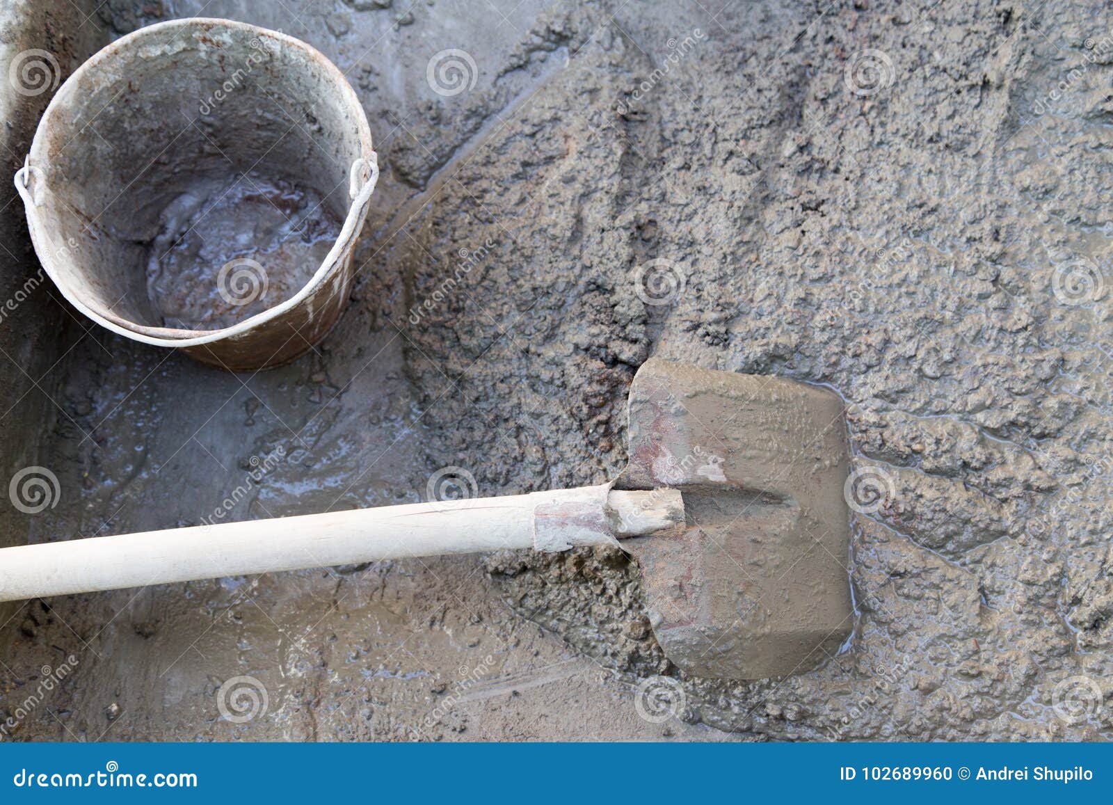 Cement Solution with a Shovel Stock Photo - Image of concrete, plate