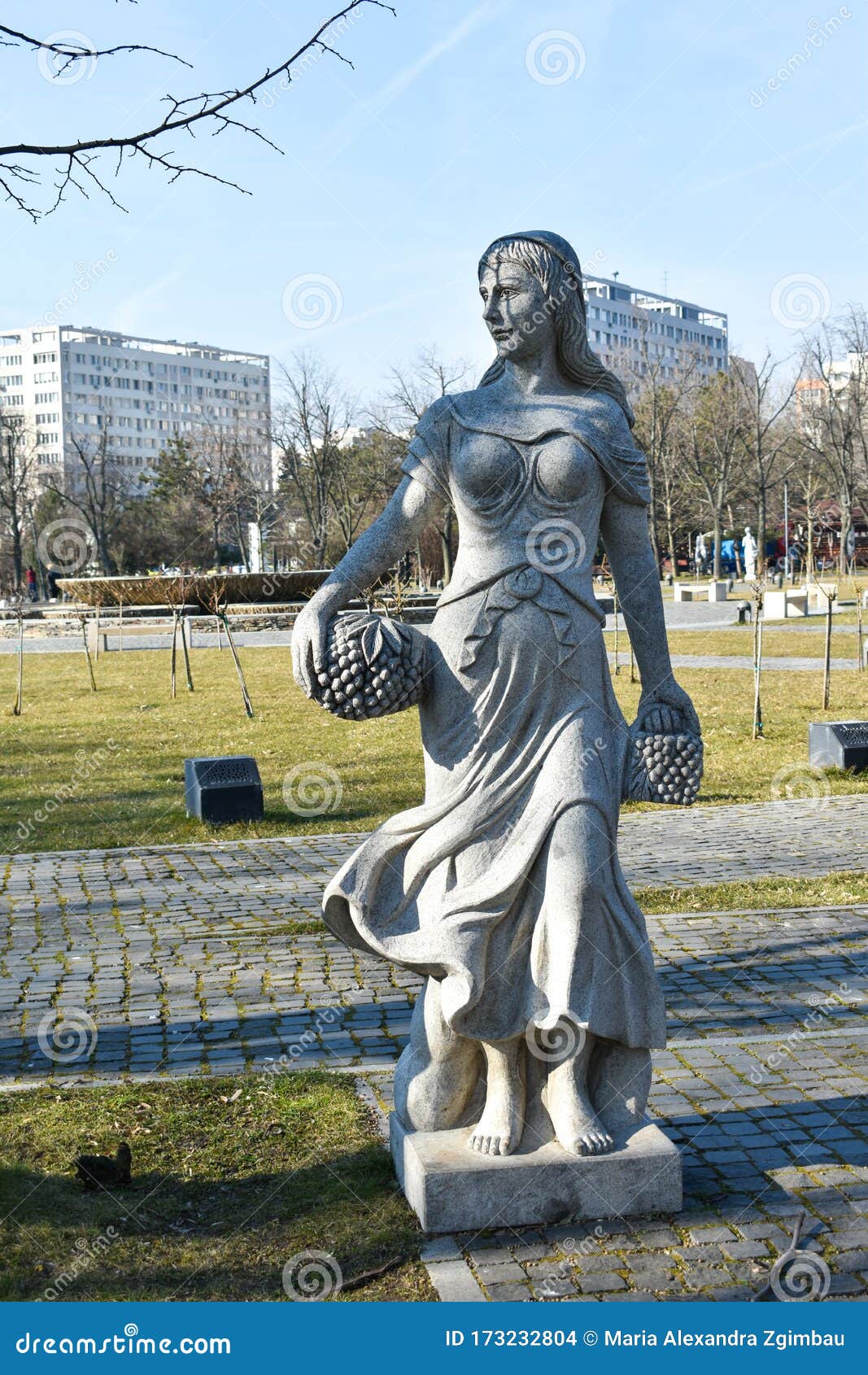 Cement Statue of a Woman in the Park Editorial Stock Image - Image of