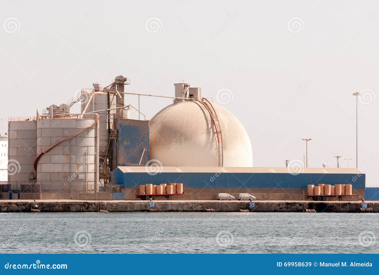 Cement warehouse stock image. Image of harbors, gran 69958639