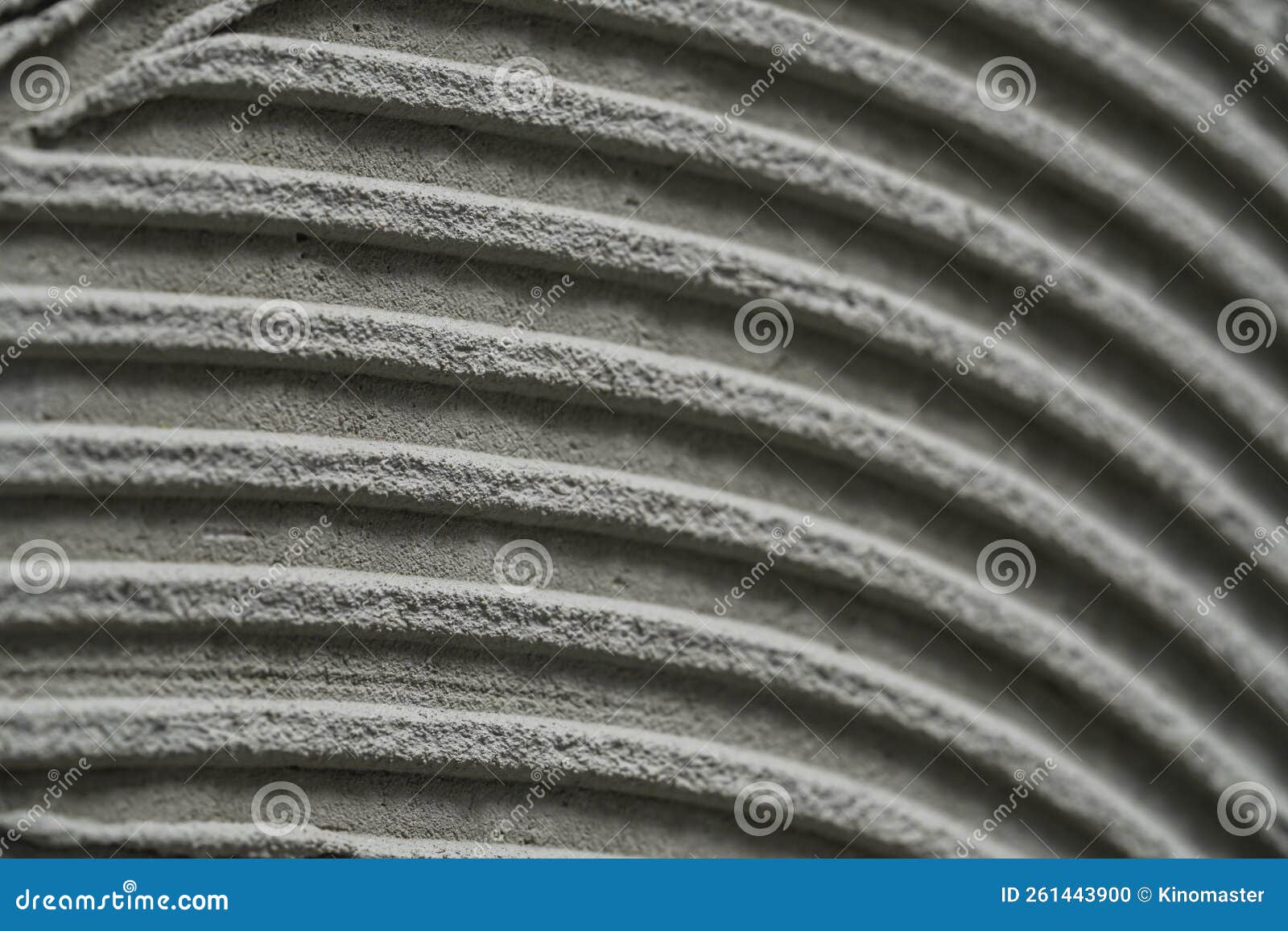 Cementitious Adhesive Applied To Floor or Wall Ready To Receive the