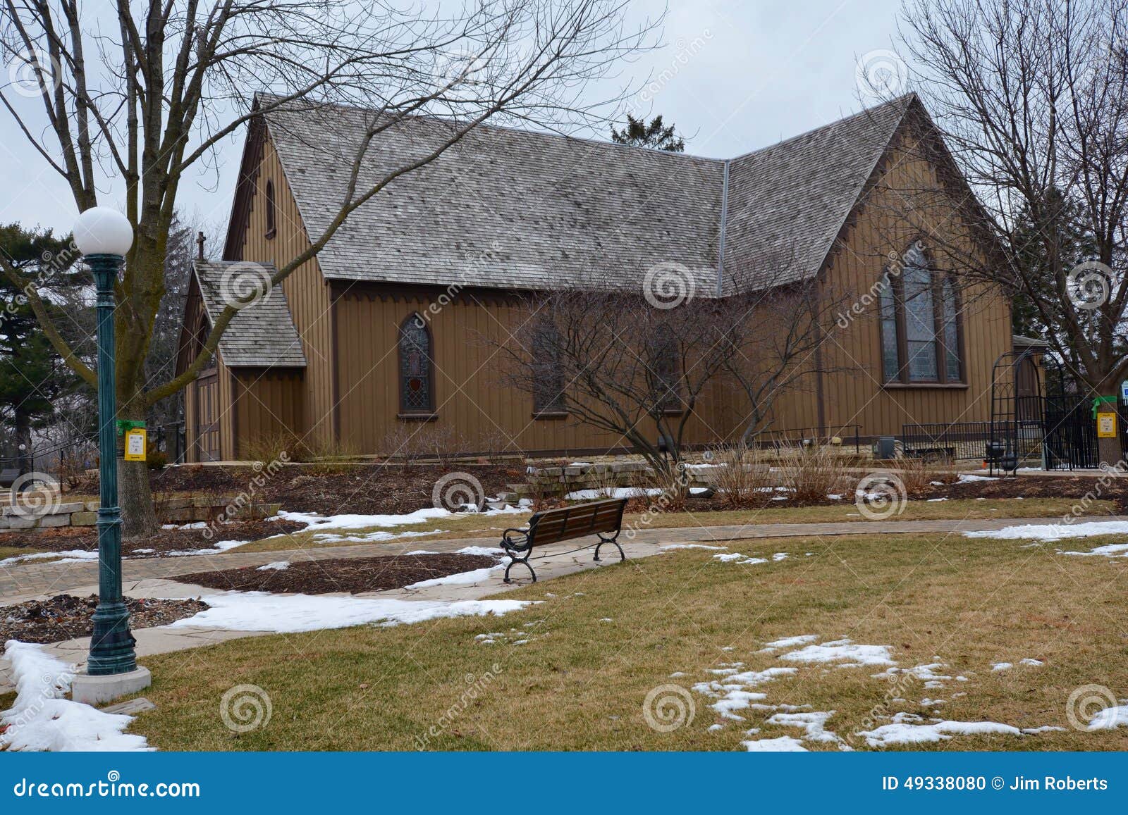 Century Memorial Chapel. This is a winter picture of St. Johns Episcopal Church in Naperville, Illinois. The church is an example of the Gothic Revival style of architecture and was built in the 1870s. This picture was taken on January 22, 2015.