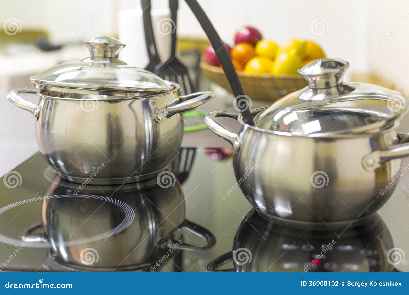 Ceramic hob with pans stock photo. Image of spoons, kitchen 36900102