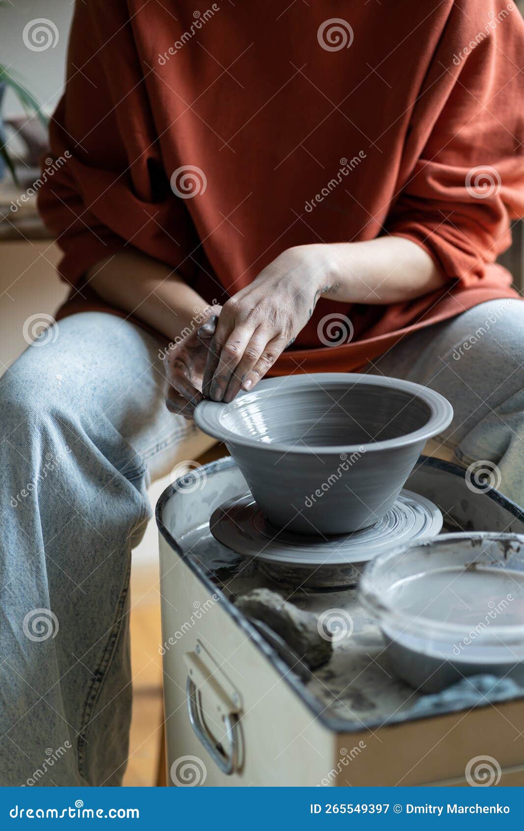 Ceramic Master Creating Handmade Stoneware on Wheel in Studio, Forming Clay into Shape Stock
