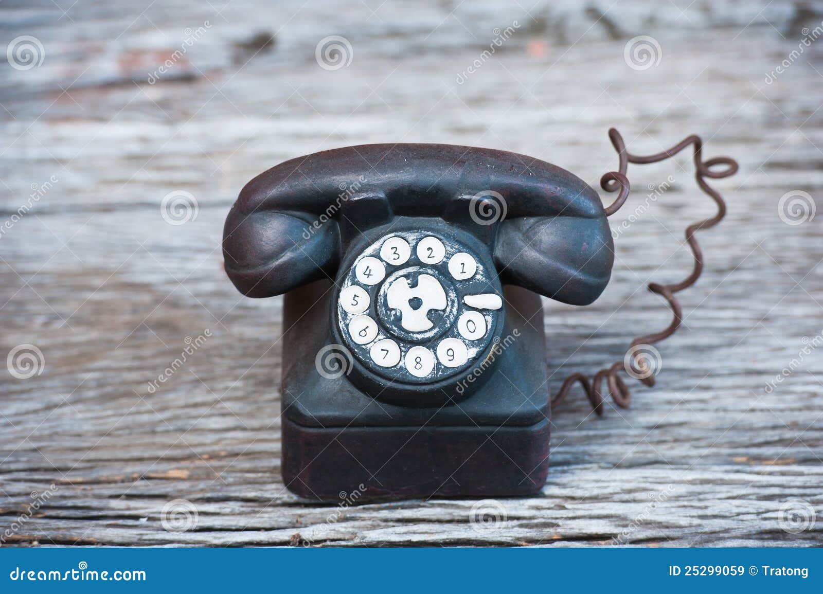 Ceramic phone on wood stock image. Image of shot, still 25299059