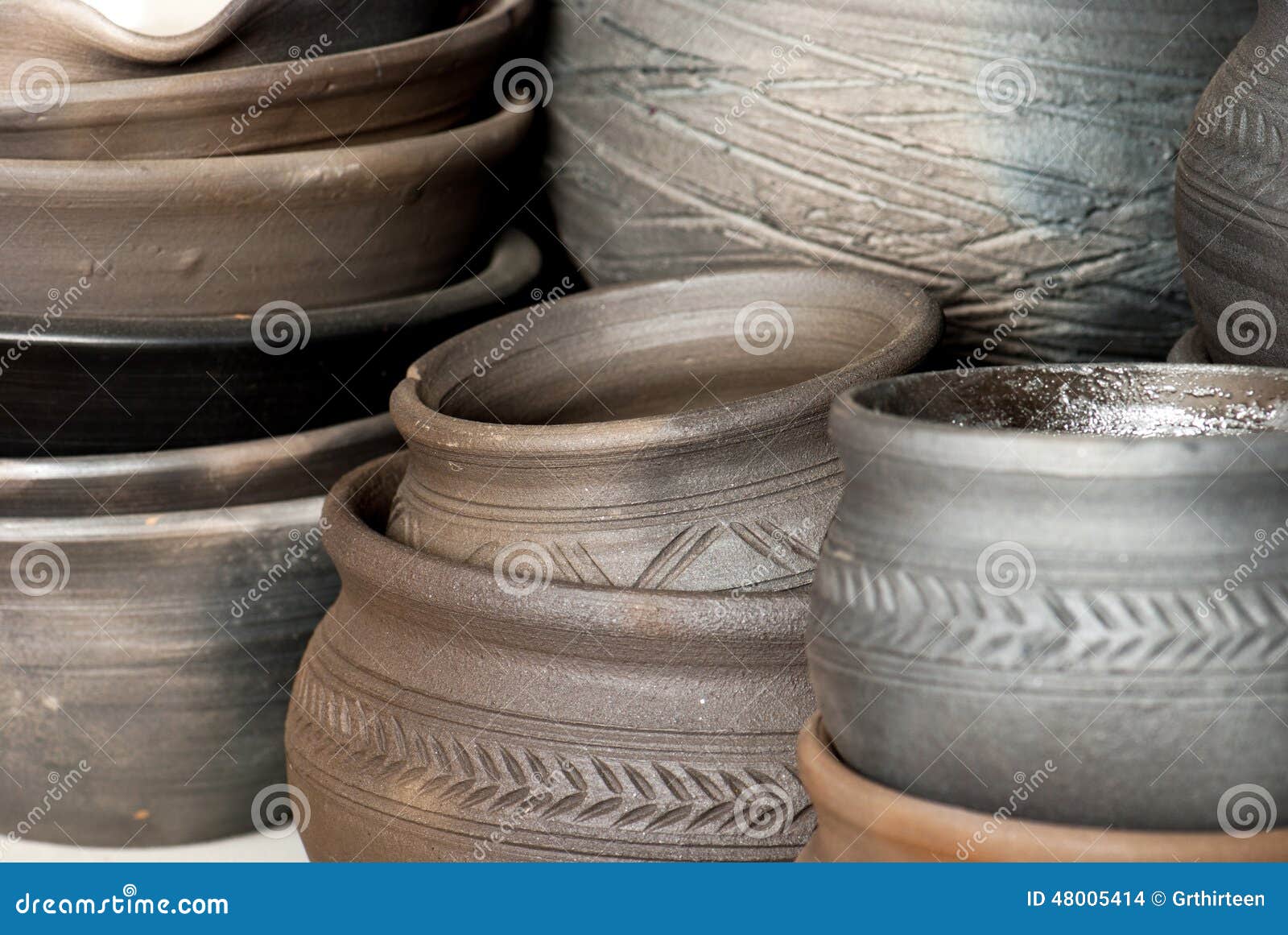 Old Ceramic Pots Through Which Water Flows RoyaltyFree Stock Photo