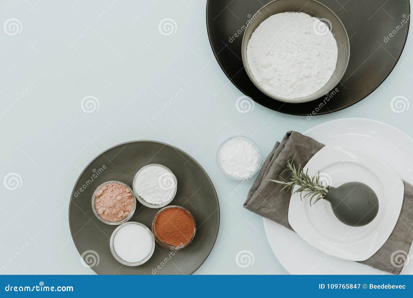 ceramic tableware with baking ingredientes. top view on pastel background mock up.