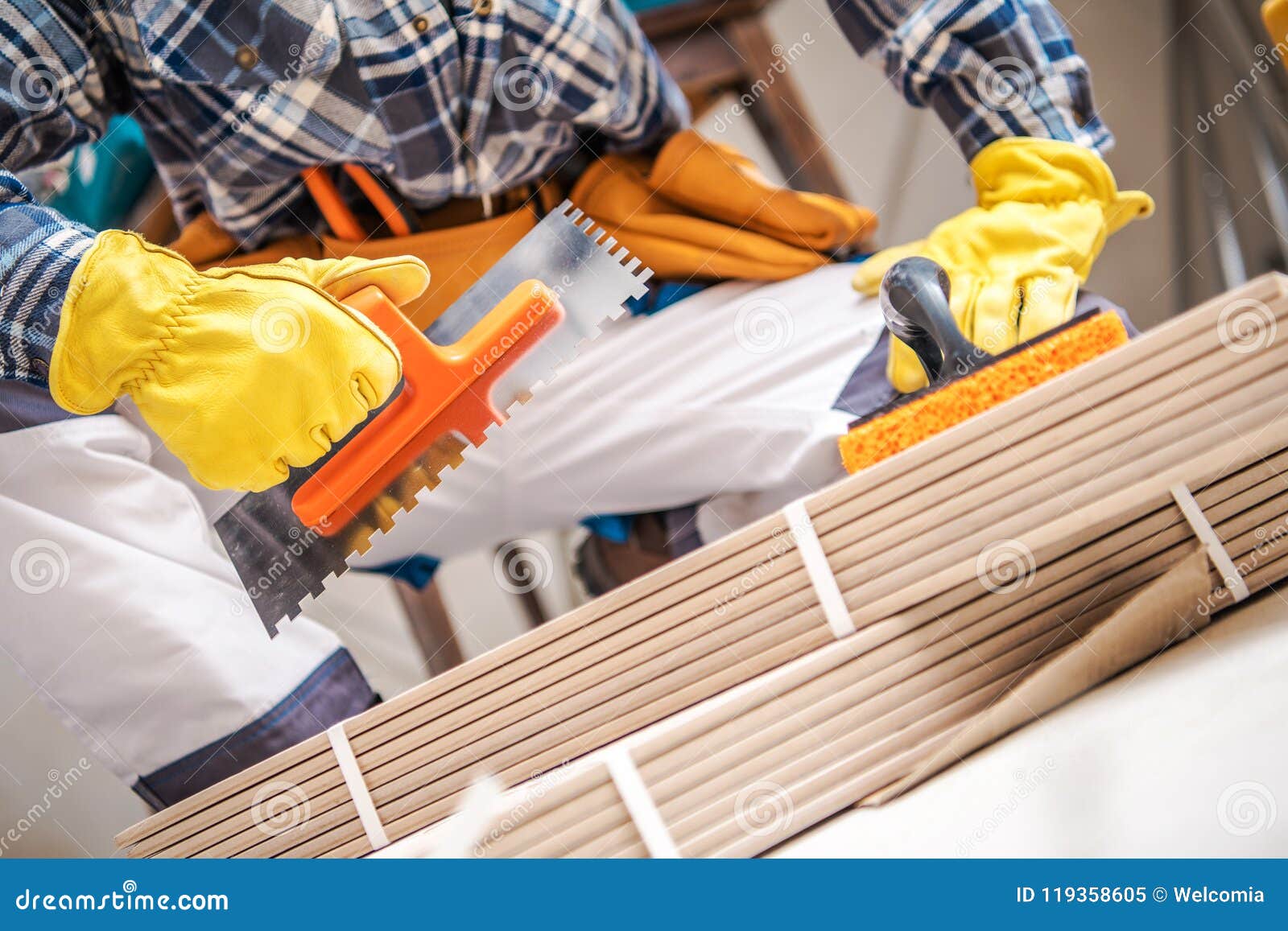 Ceramic Tiles Installer stock image. Image of installer 119358605