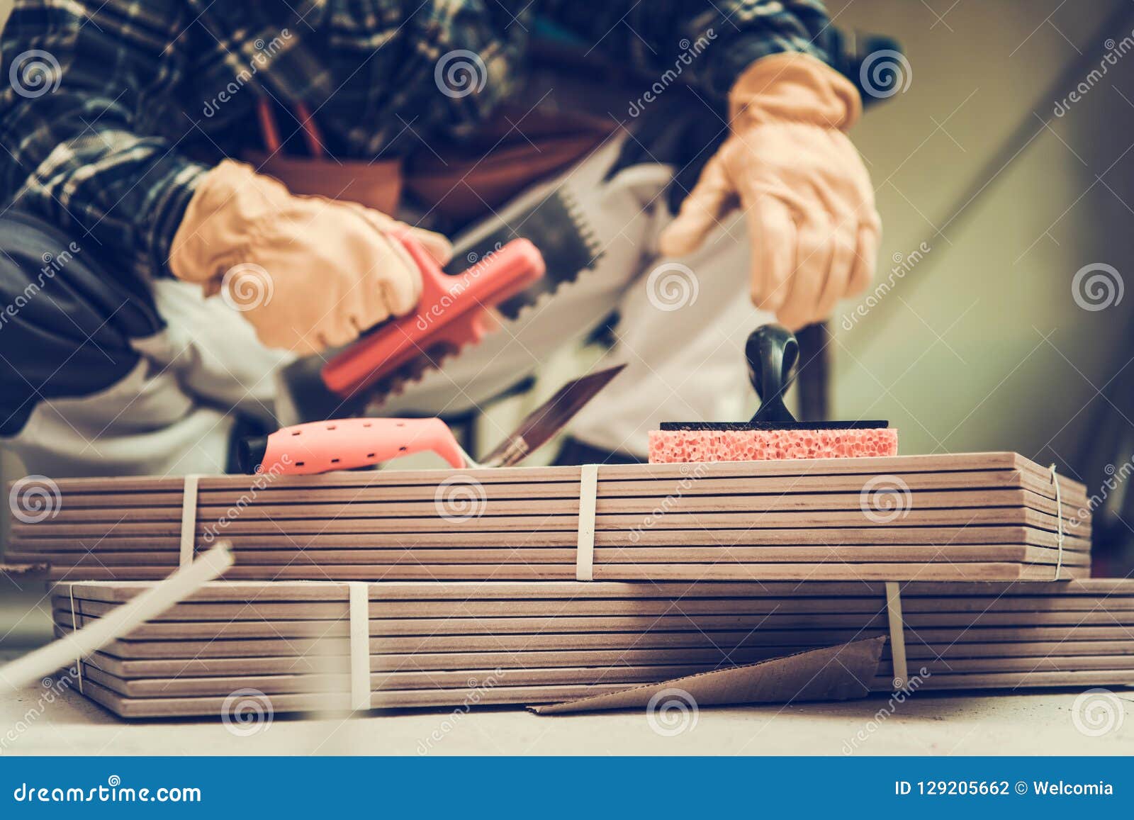 Ceramic Tiles Installer stock photo. Image of residential 129205662
