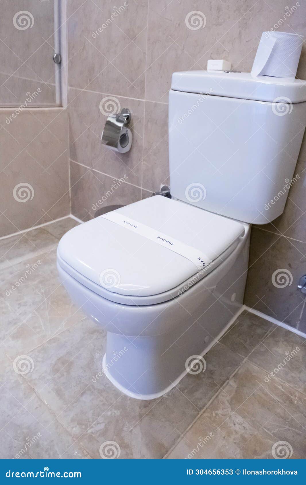 Ceramic Toilet Bowl Near Brown Marble Wall Stock Image Image of wall