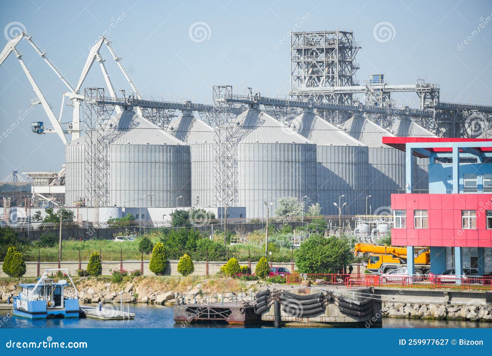 Cereal warehouse in a port stock image. Image of corn 259977627