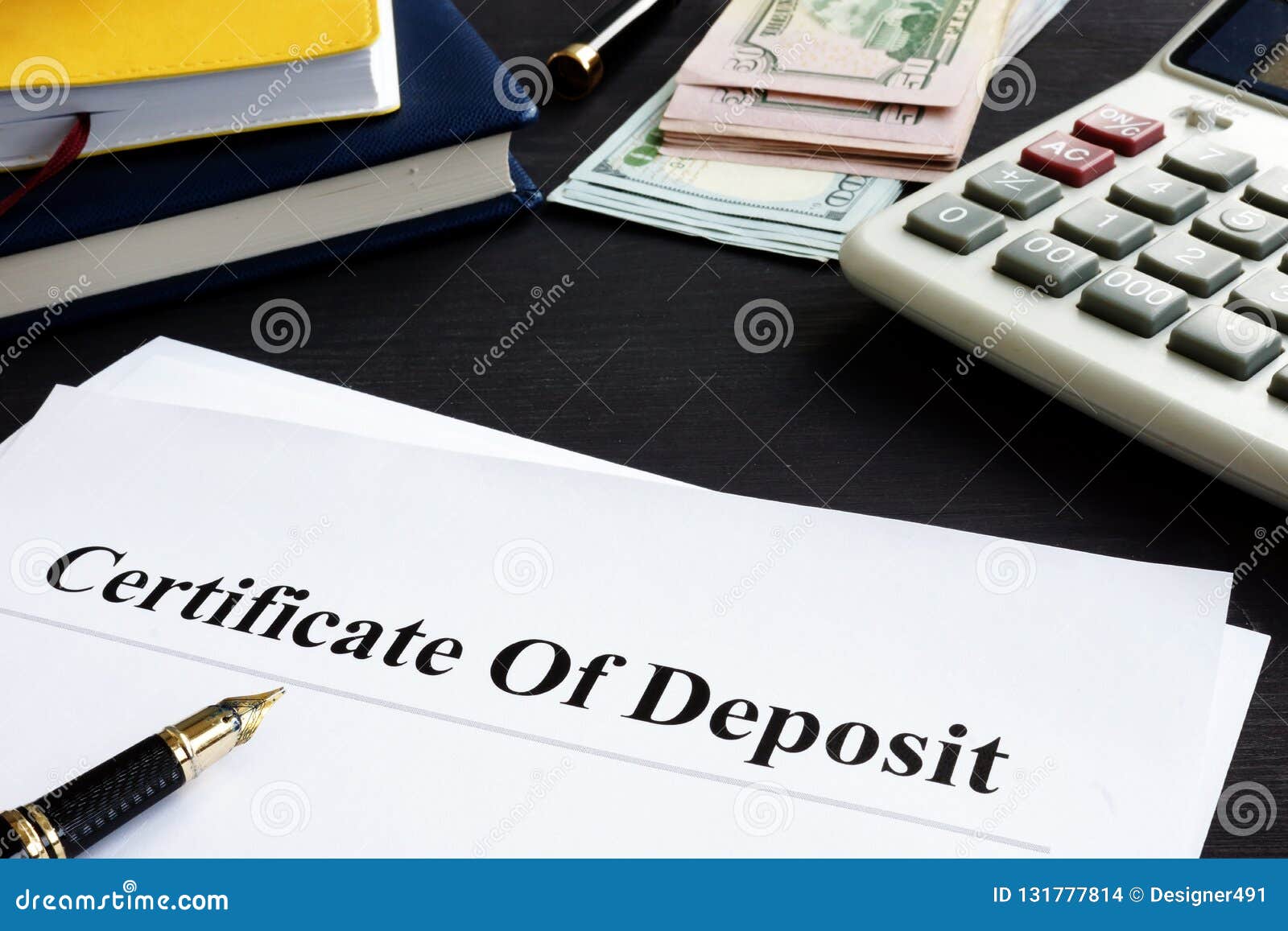 certificate of deposit and pen in the office