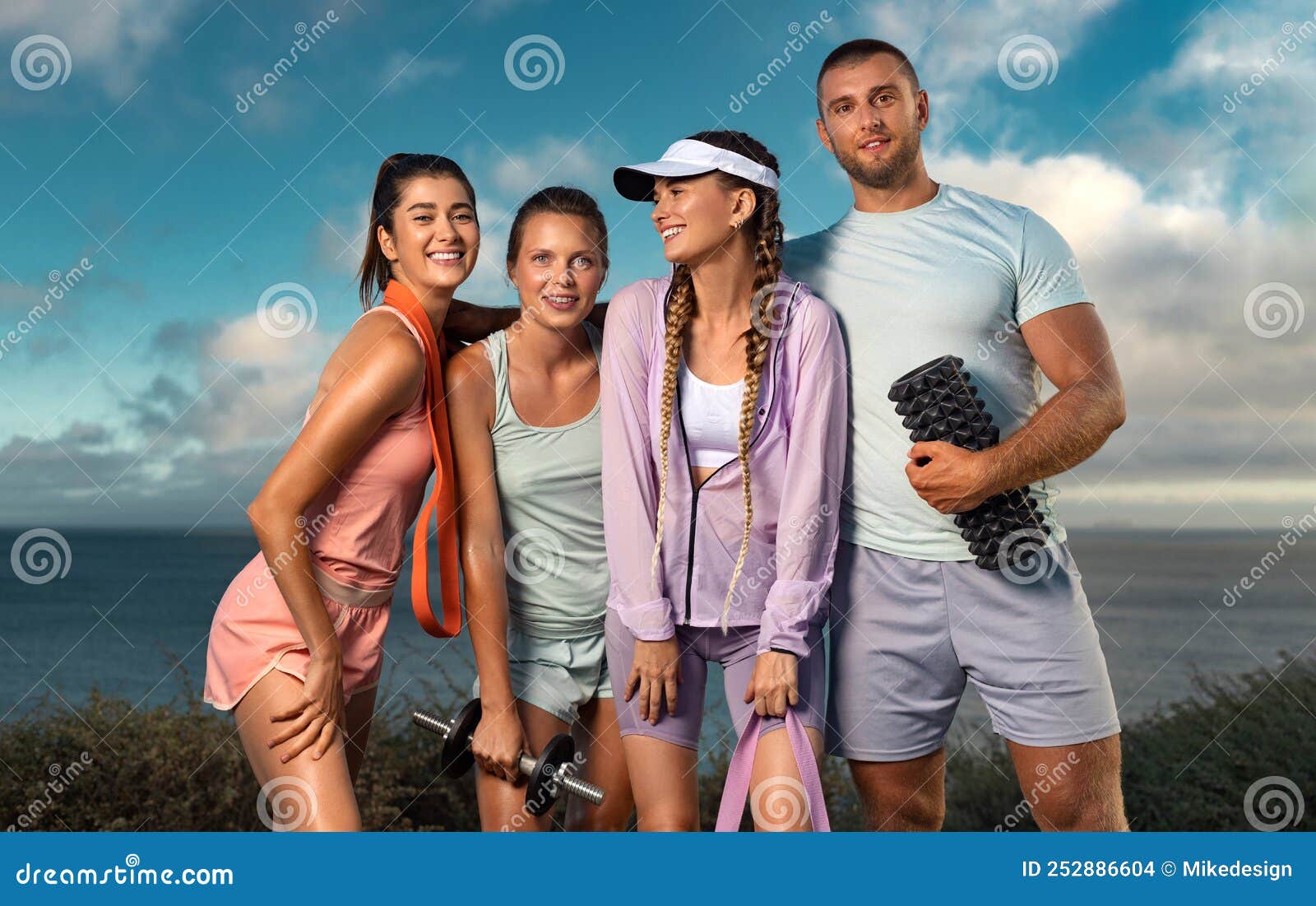 Certified Group Exercise Instructor and His Fitness Team. Premium