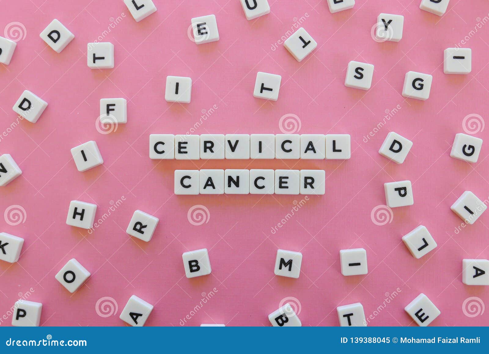 cervical cancer word made of square letter word on pink background.