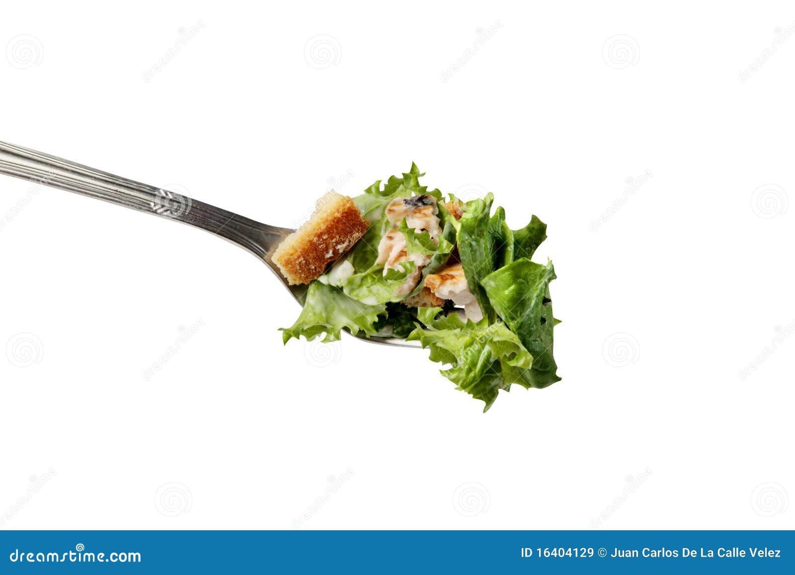 cesar salad in a fork