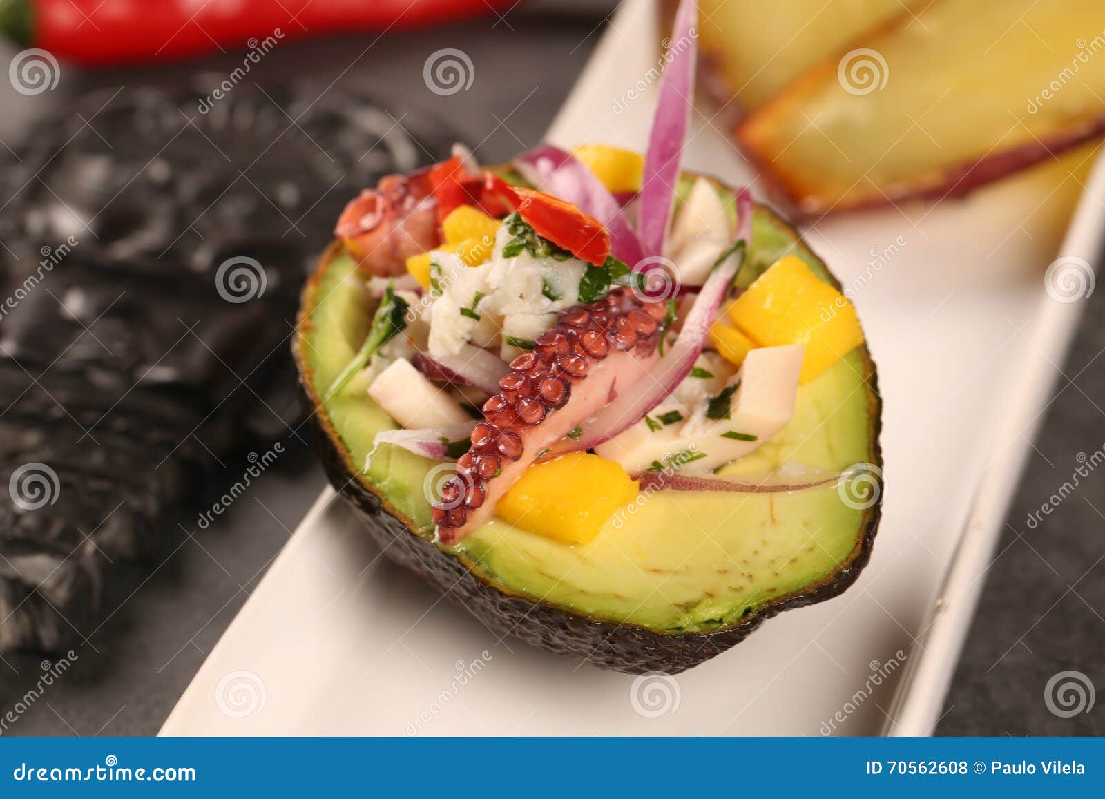 Typical Peruvian Sea Bass Ceviche Marinated With Red Onion, Peppers