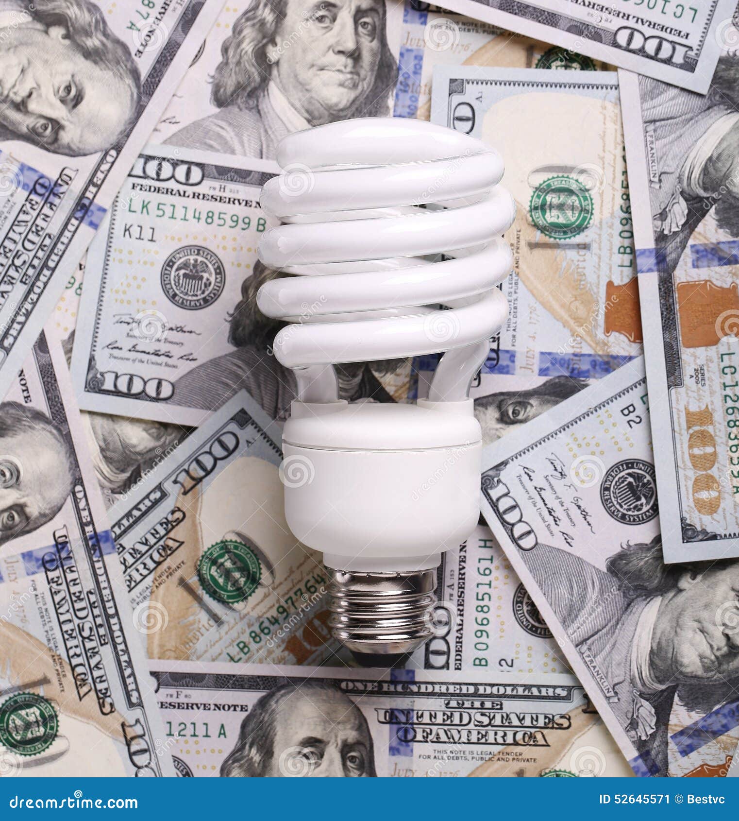 CFL Fluorescent Light Bulb on Money Dollar Cash Stock Image Image of