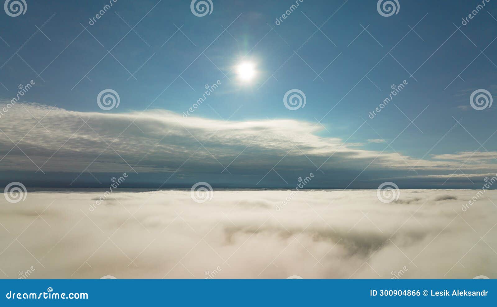 cflying high above the clouds. aerial view of clouds and horizon from drone. thunderclouds from above before rain. tragic gloomy
