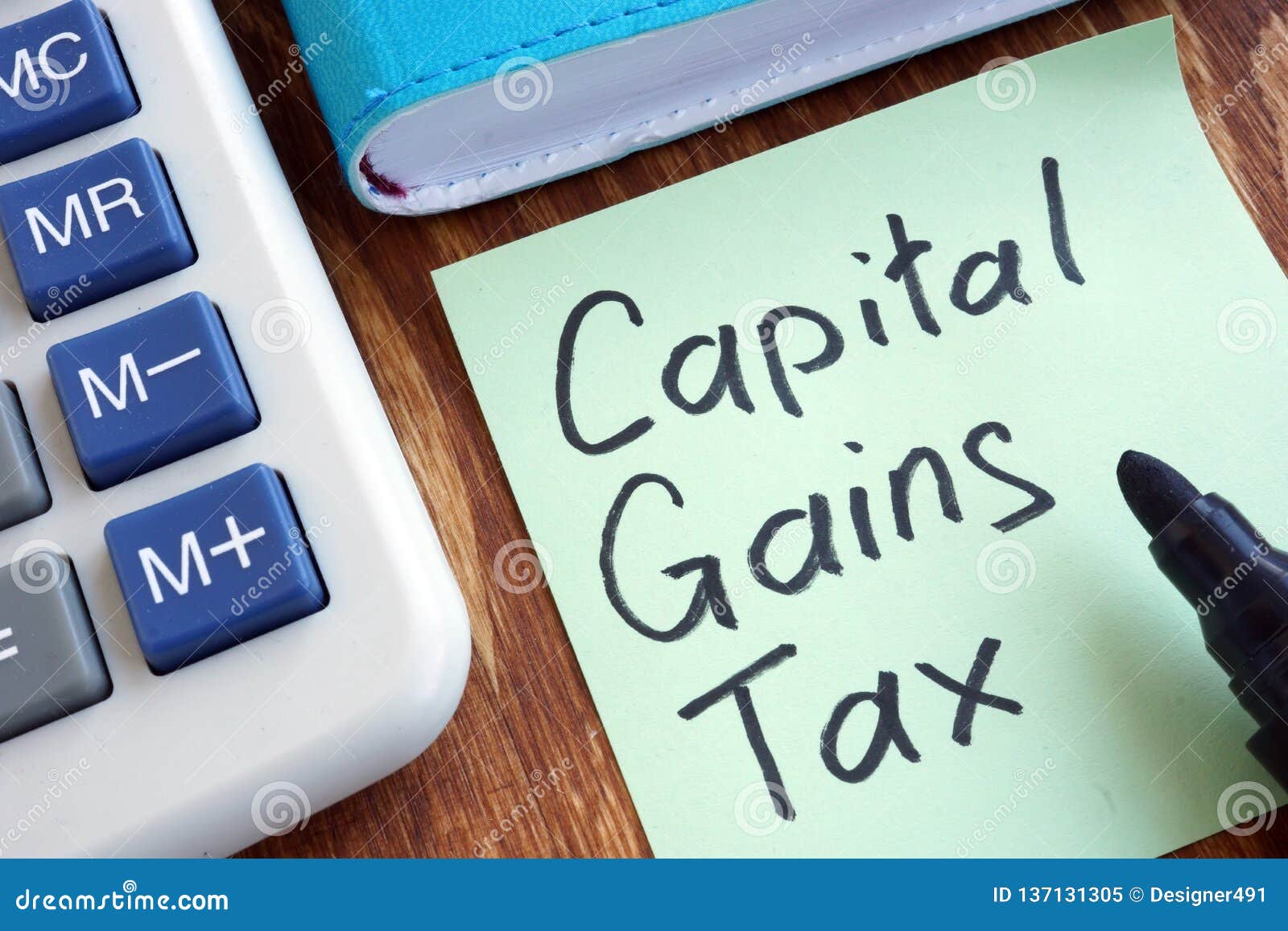 cgt capital gains tax. memo stick and calculator.