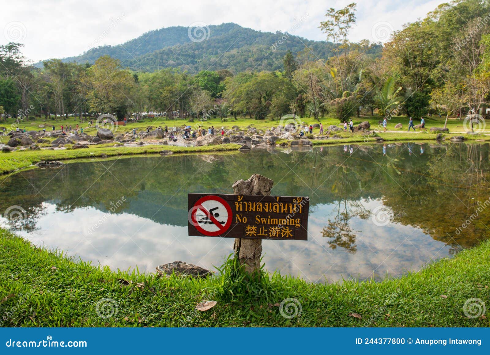 The Large Pool In Chae Son National Park With Warning Wooden Sign In Lampang Province Of