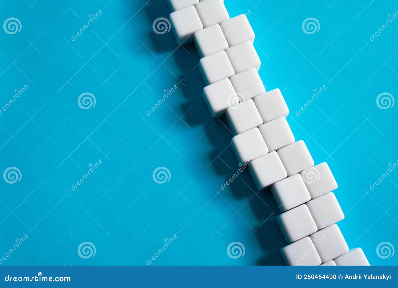 chain of blocks on a blue background. abstraction structure. concept of organization and strength. unity and consolidation.