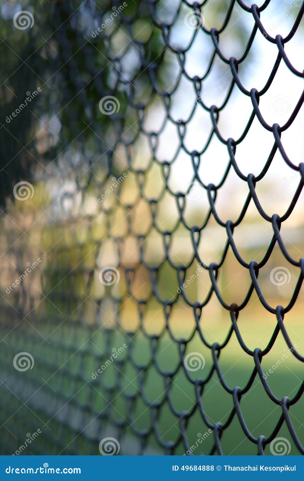 Chain link fencing Cyclone Fence. Cyclone fence blocking off , shallow depth.