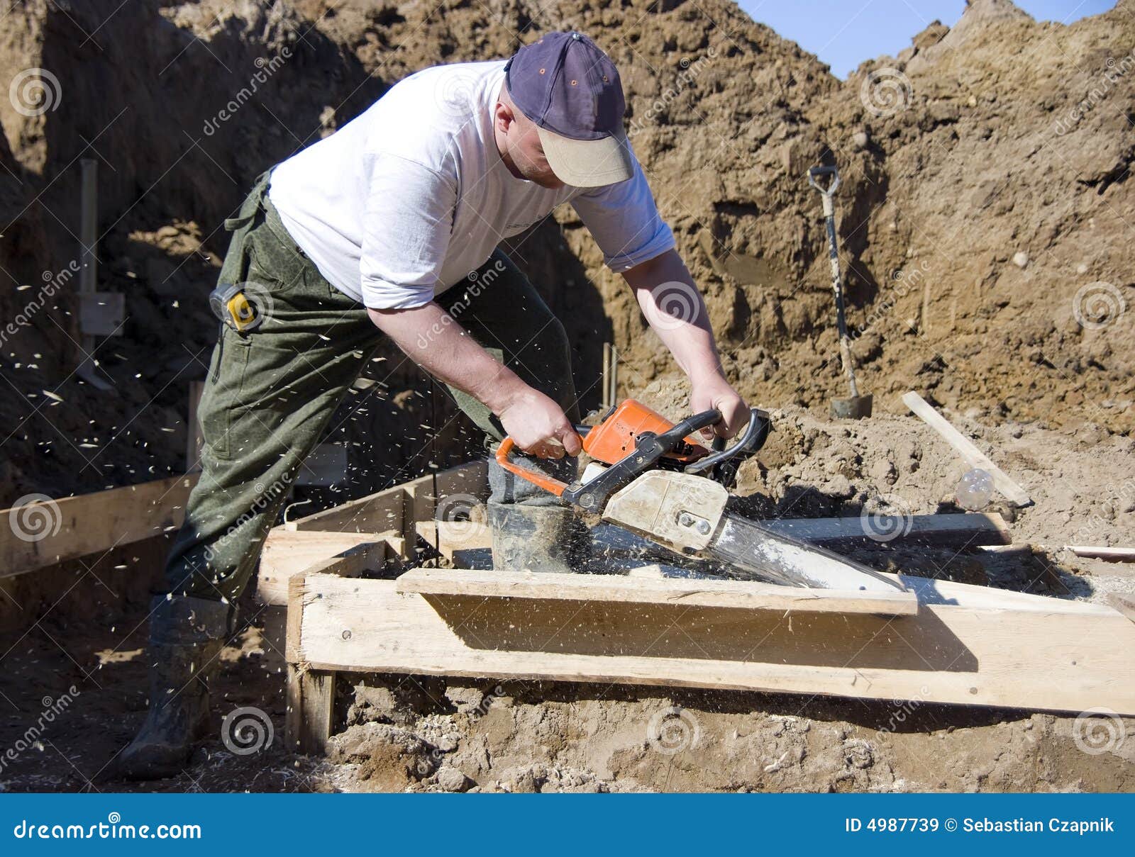Chainsaw cutting stock image. Image of chainsaw, worker 4987739