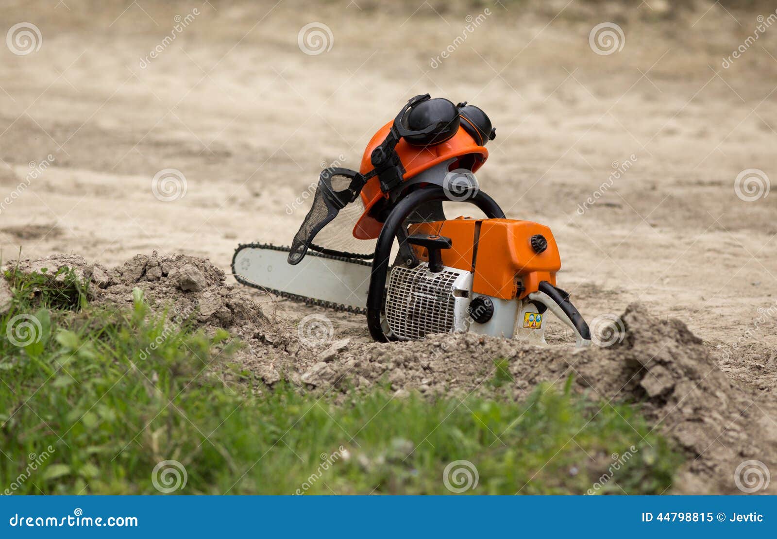 Chainsaw and helmet stock image. Image of industry, professional 44798815