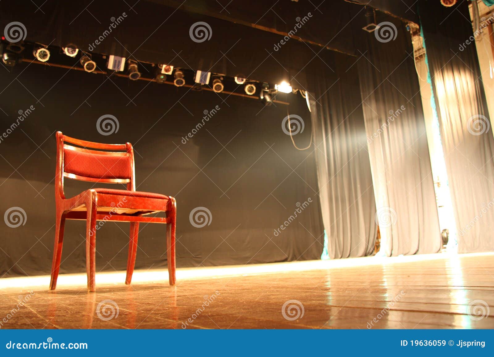 chair on empty theatre stage