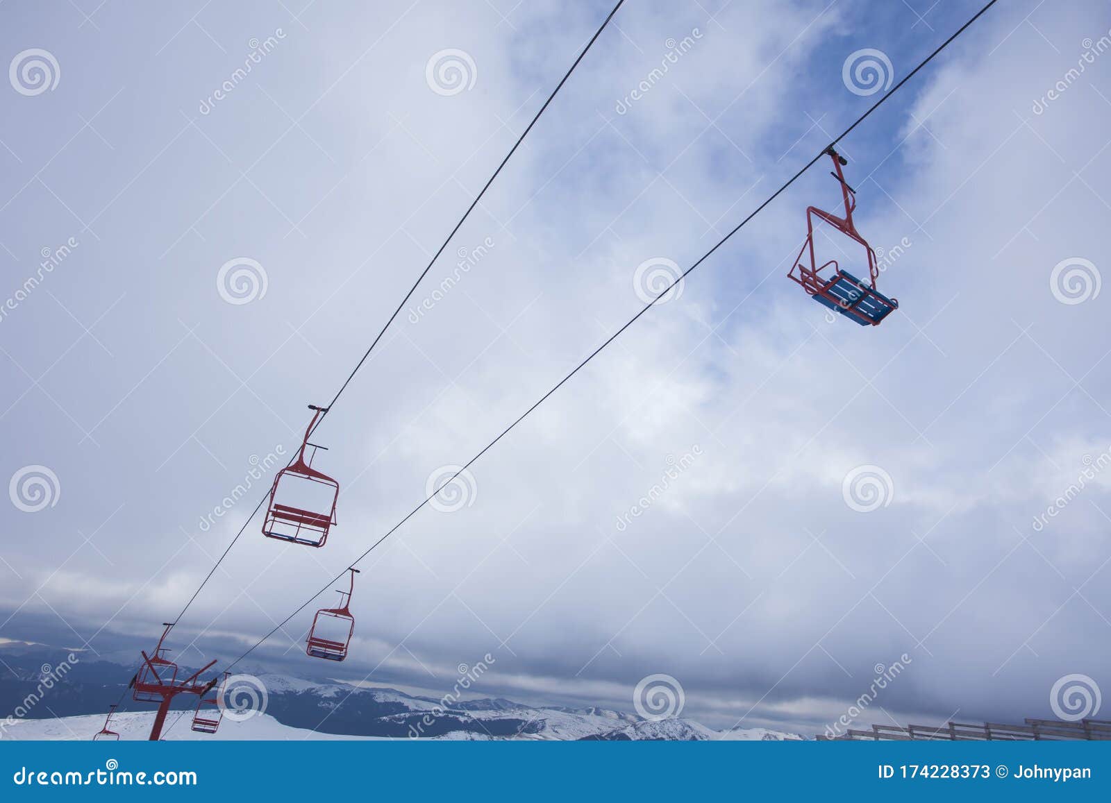 Chair lift for ski slope stock image. Image of alpine 174228373