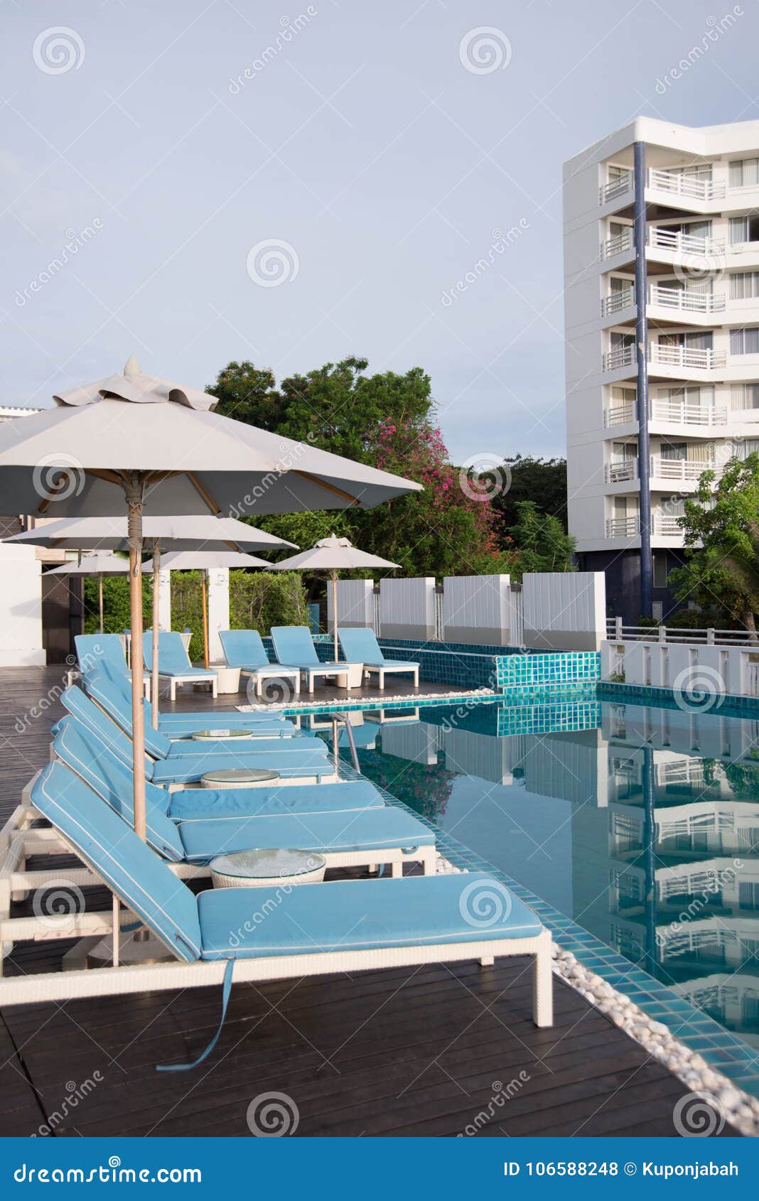 Chair near the pool stock photo. Image of resort, summer 106588248