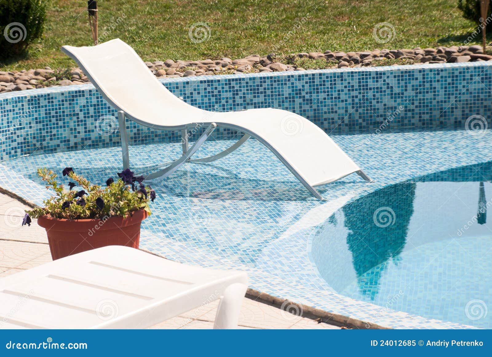 Chair near swimming pool stock image. Image of liquid 24012685