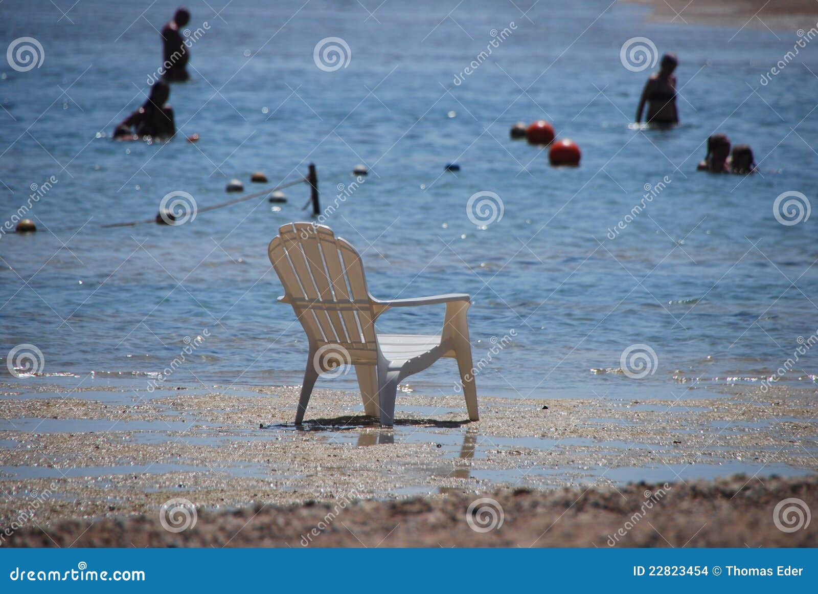 Chair in the sea stock photo. Image of ocean, beach, shore 22823454