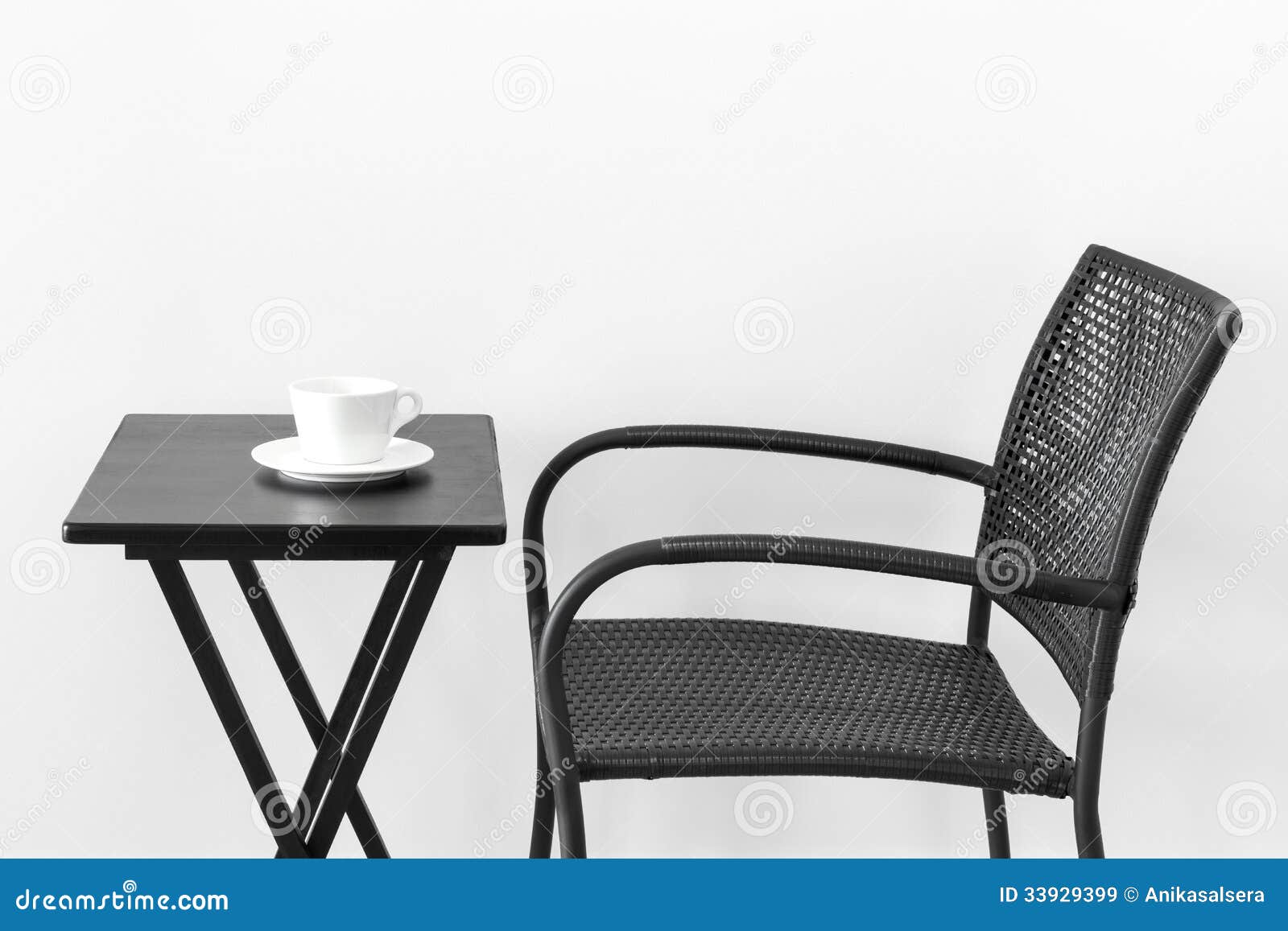 Chair, table and teacup stock image. Image of indoors - 33929399