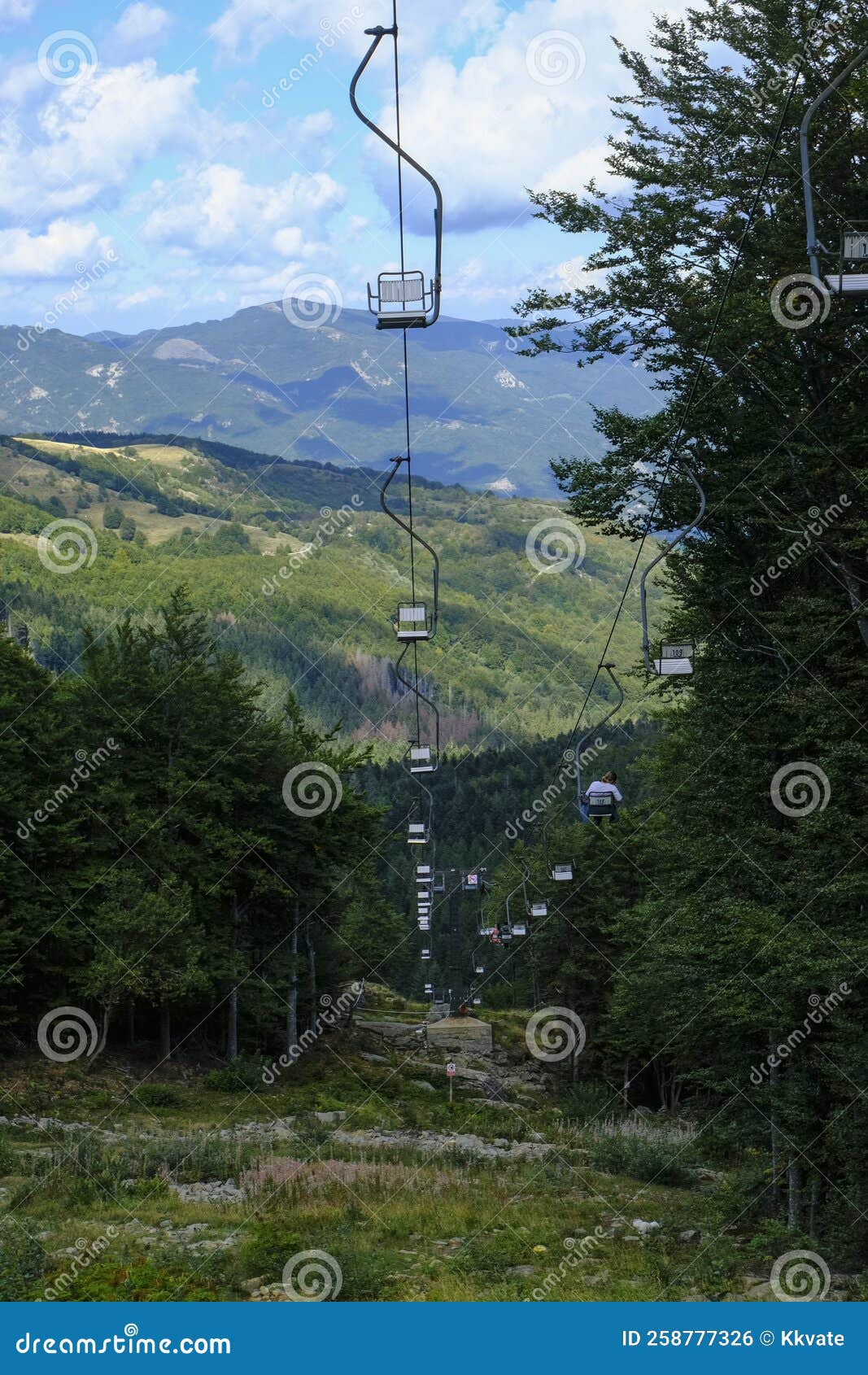 chairlift across the mountains and cloudy sky. national park appennino tosco-emiliano. lagdei, emilia-romagna