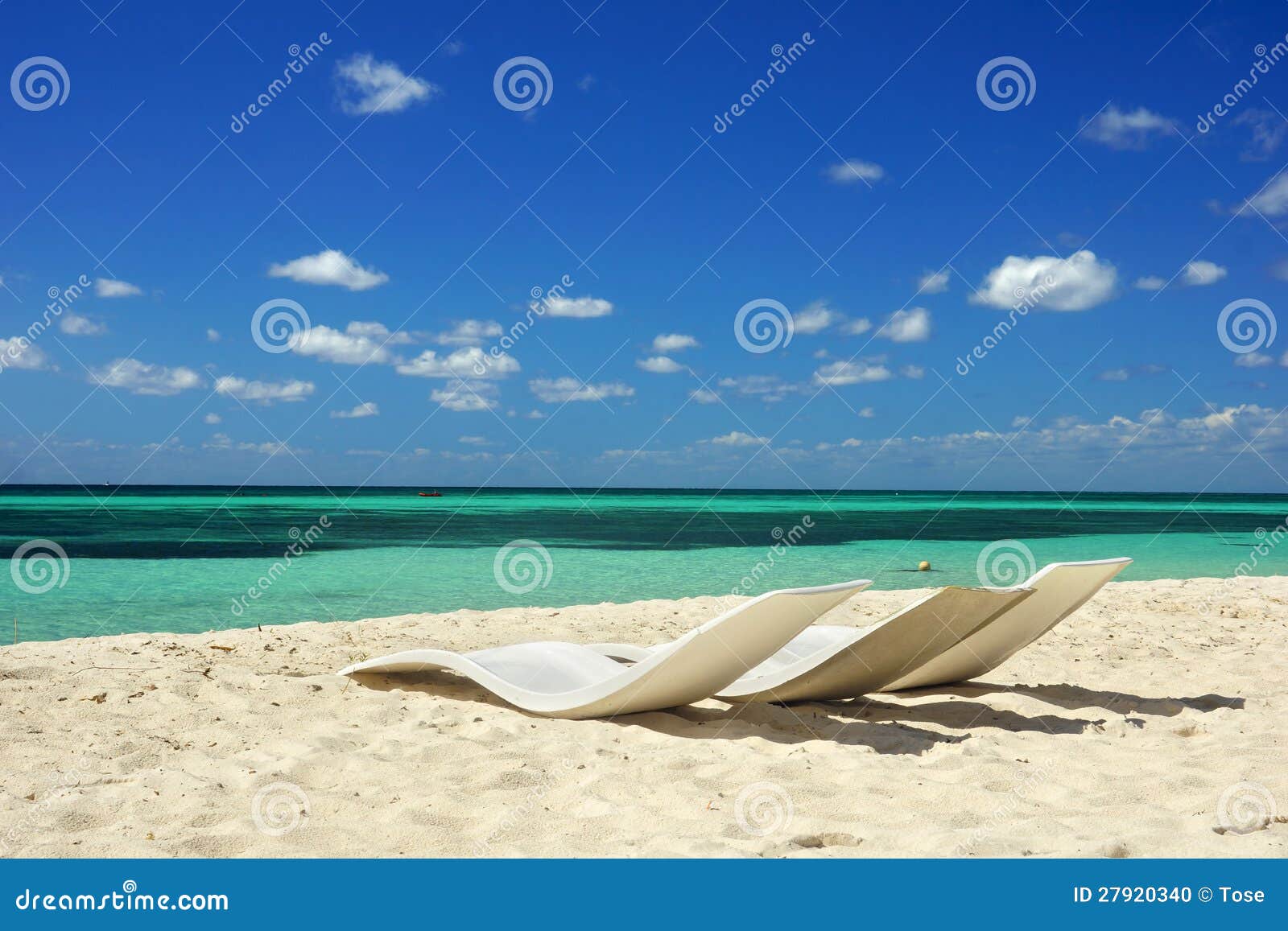 chairs on the beach, cozumel, mexico