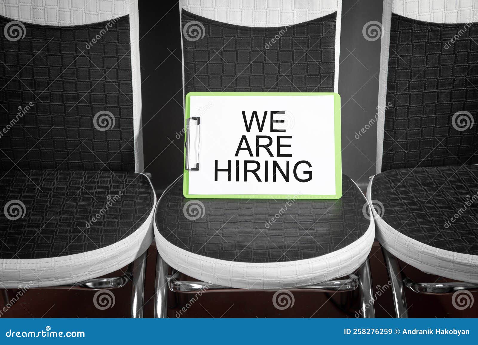 Chairs with a we are Hiring Message. Concept of Hiring and Recruiting