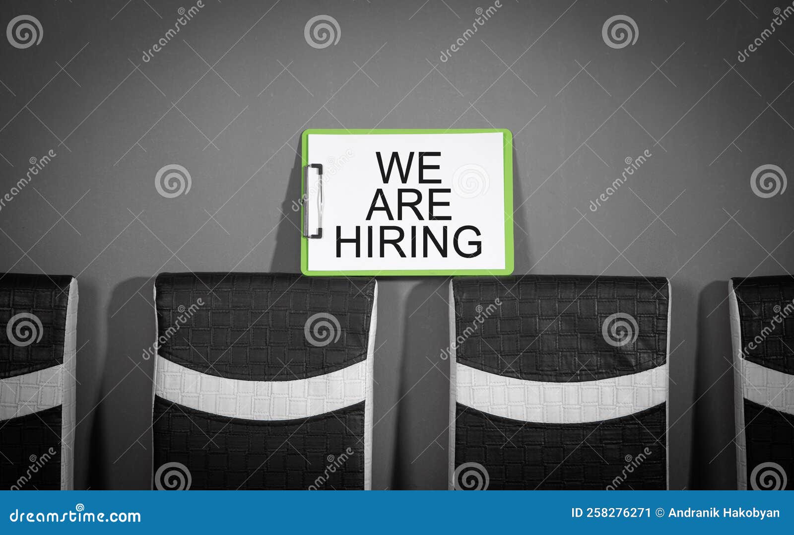 Chairs with a we are Hiring Message. Concept of Hiring and Recruiting