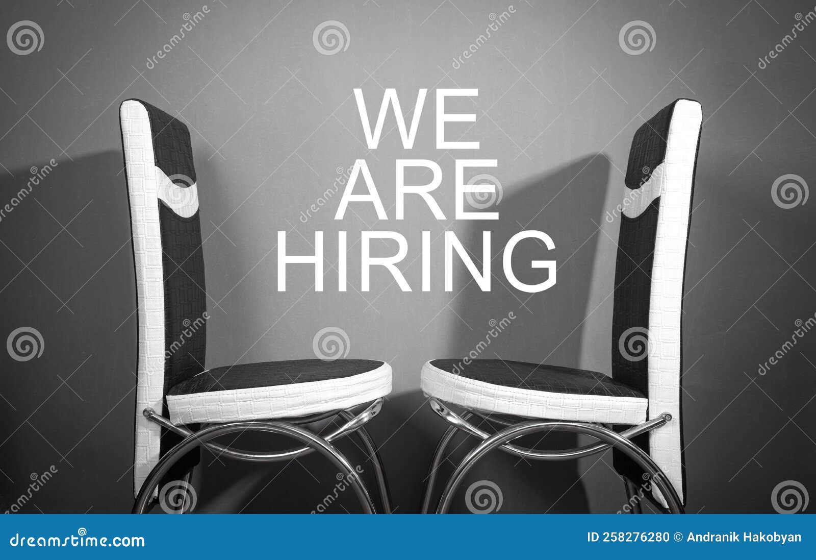 Chairs with a we are Hiring Message. Concept of Hiring and Recruiting