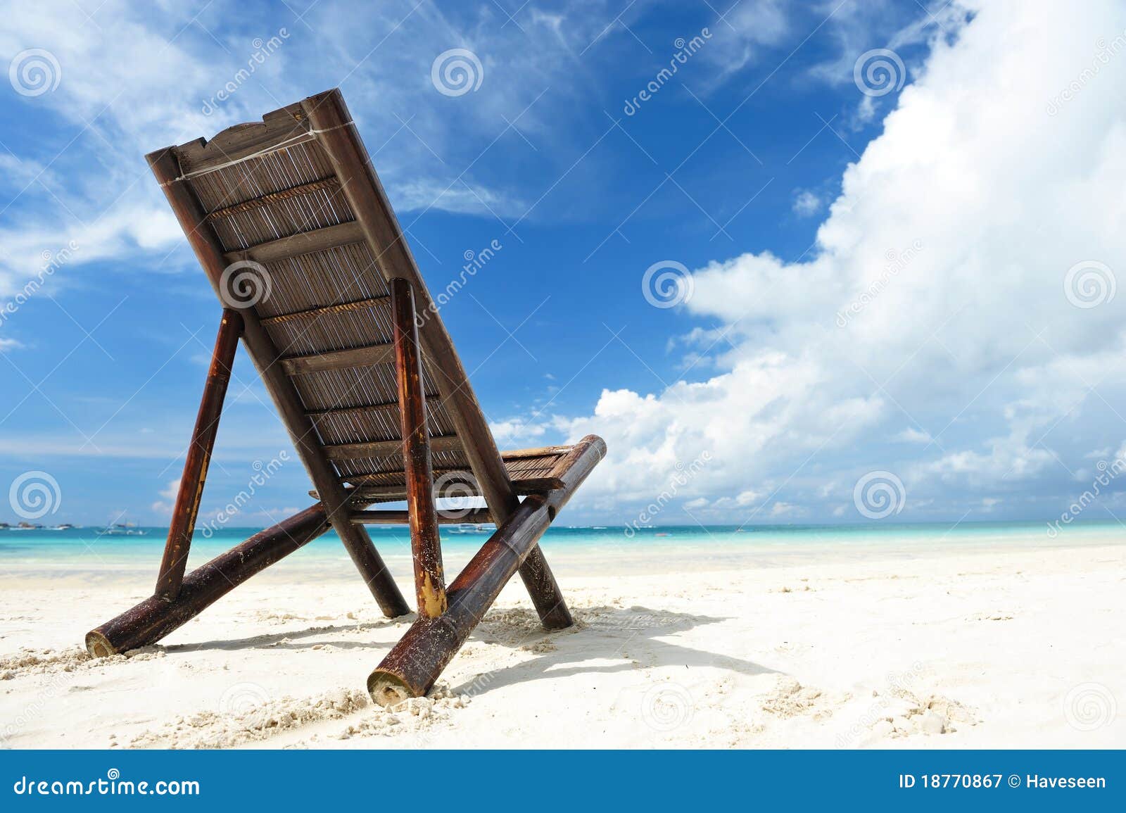 Chaise lounge at beach stock image. Image of blue, water 18770867