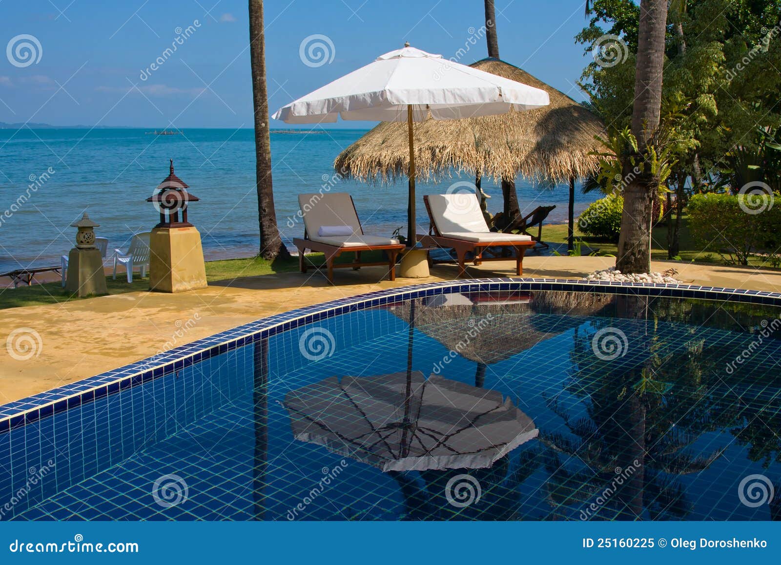 Chaise lounge by the pool stock image. Image of leisure 25160225
