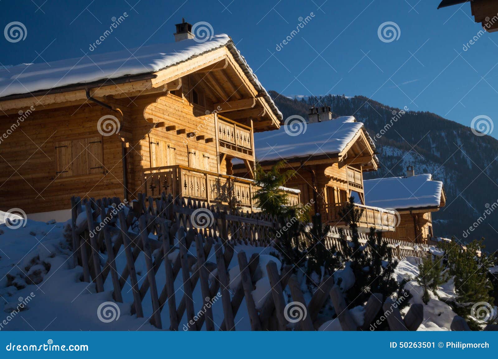 Swiss alpine chalets stock image. Image of skiing, snow - 50263501