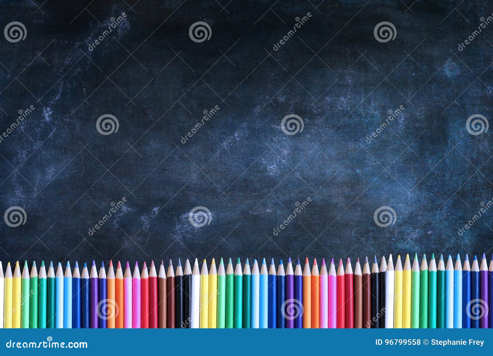 Chalkboard Texture Background with Colored Pencils Stock Photo Image