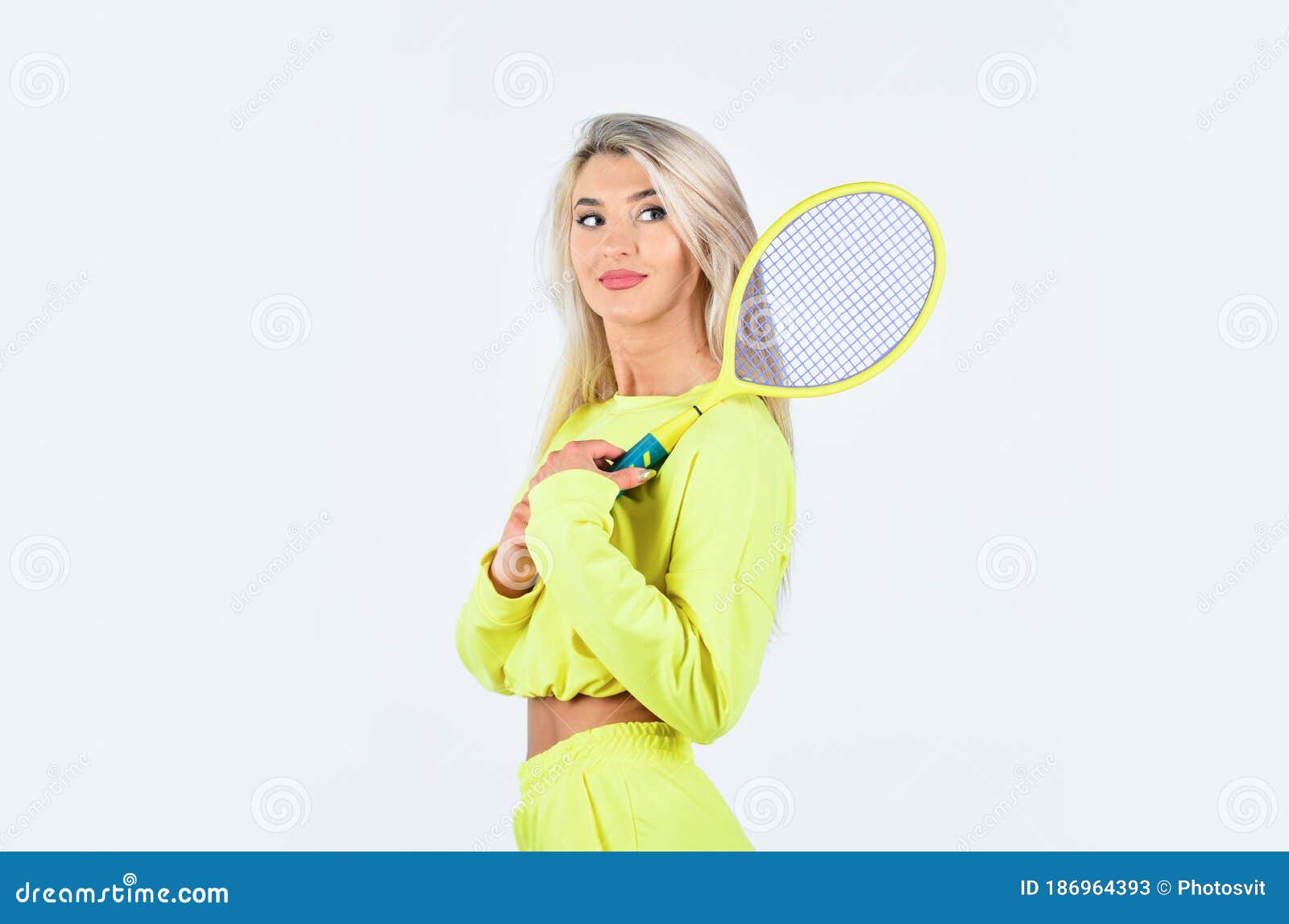 Challenging Herself Woman Playing Tennis At Court Focus On Racket Hitting Ball Professional