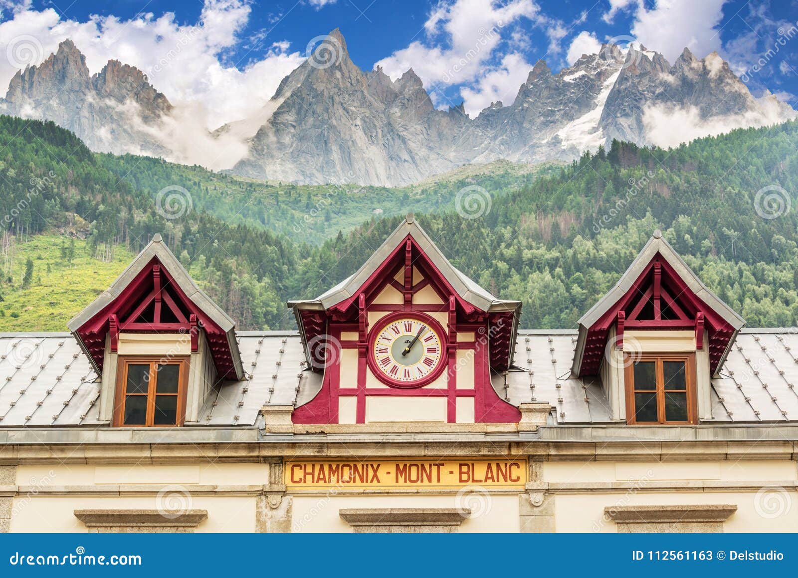 chamonix mont blanc train station, les aiguilles de chamonix in the backgound, the alps france