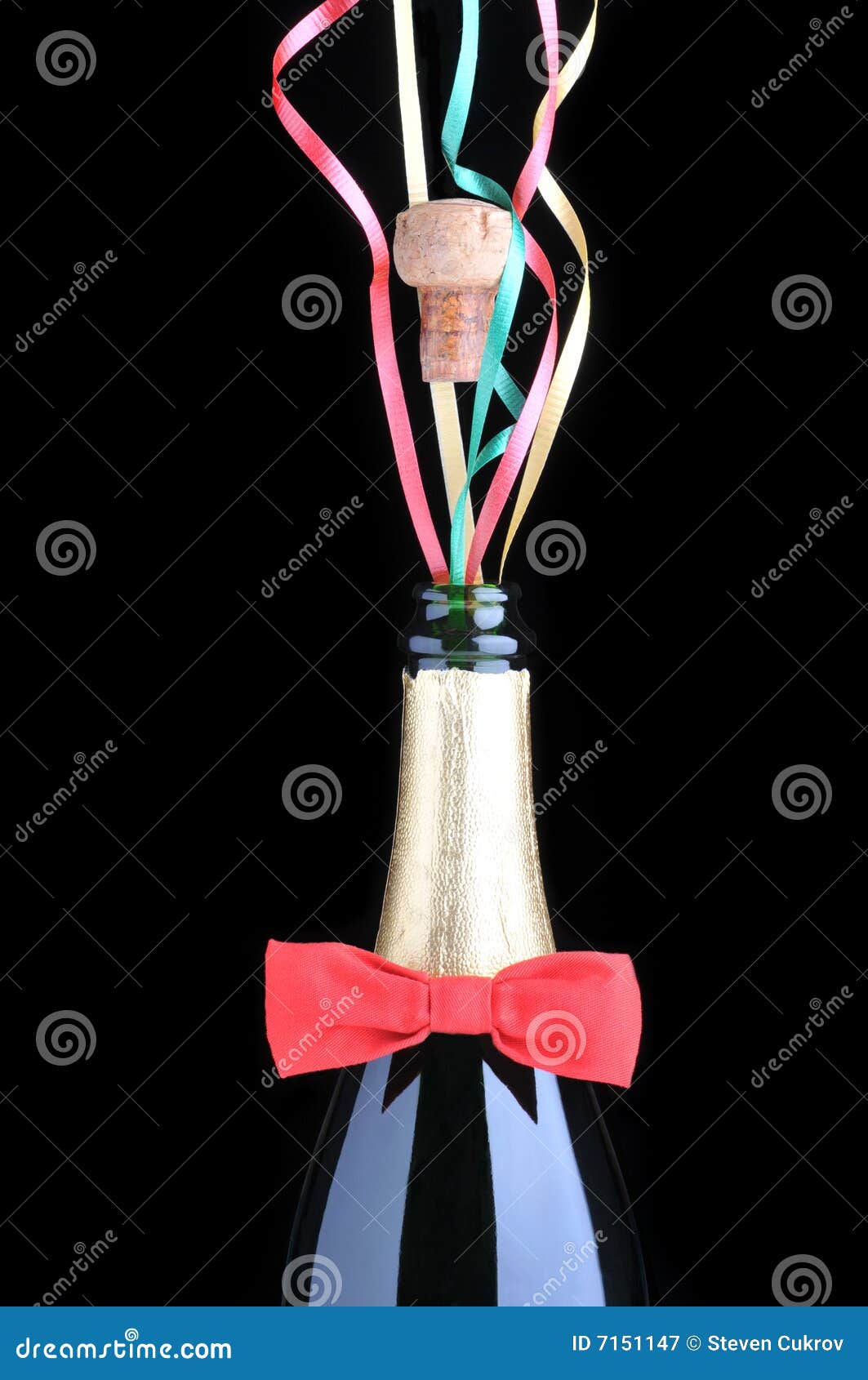 Champagne Bottle With Red Bow Tie And Ribbons Royalty Free Stock
