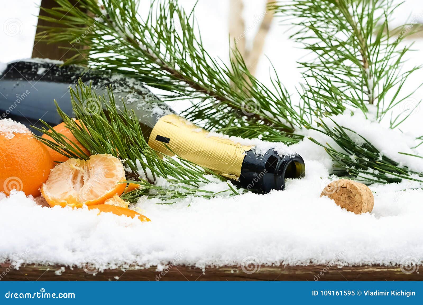 Champagne and Christmas Decorations in the Snow. Holiday Decorat Stock ...