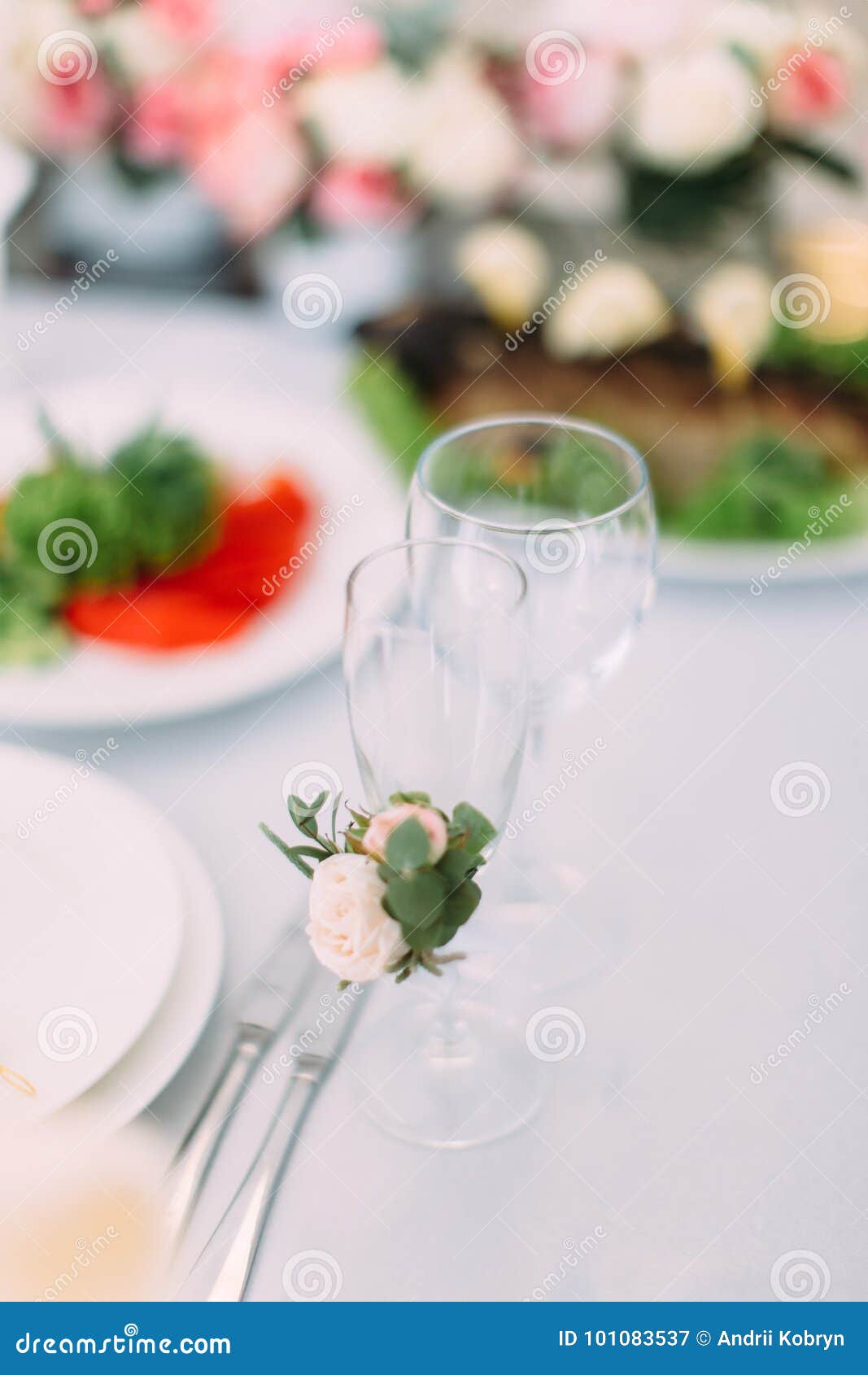 The Champagne Glass is Decorated with Little White Rose. Stock Image