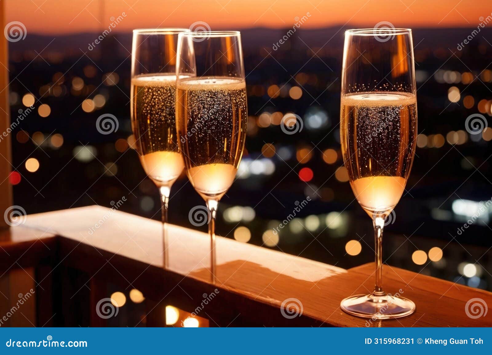 champagne glasses flutes on balcony overlooking city, festive special occasion