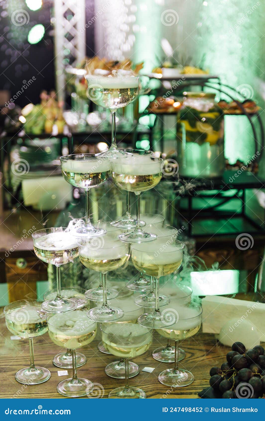 Champagne Glasses Standing in a Tower at the Party Stock Photo Image